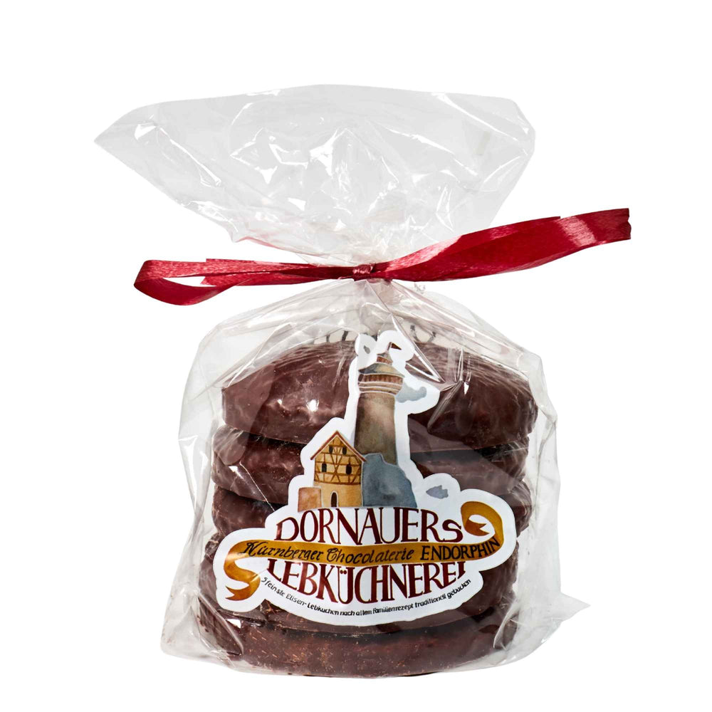 Fünferpack Elisen-Lebkuchen von Dornauers Lebküchnerei mit dunkler Schokolade, nussiger Struktur und handwerklicher Optik.