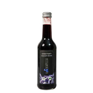 Flasche mit Haskap-Direktsaft aus Bio-Beeren, naturtrüb und tiefrot