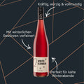 Winzer-Glühwein rot „Ein Wintermärchen“ vom Weingut Quint in klarer Flasche mit schlichtem Etikett.
